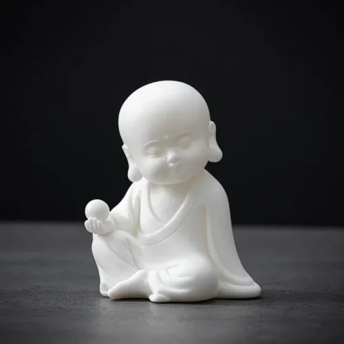 White ceramic Buddha statue tabletop ornament